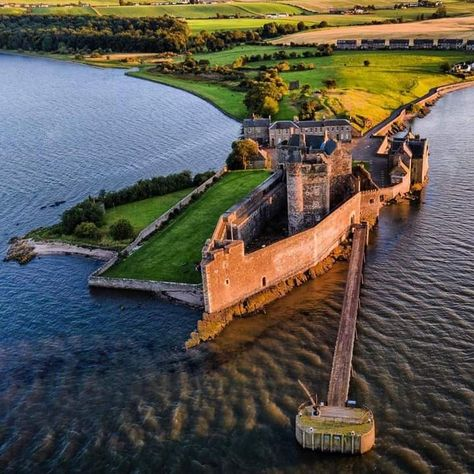 Aerial view of Blackness Castle on the peninsula