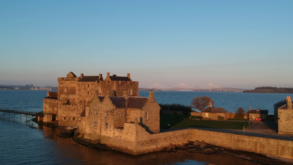 Blackness Castle on the Firth of Forth with the Forth bridges